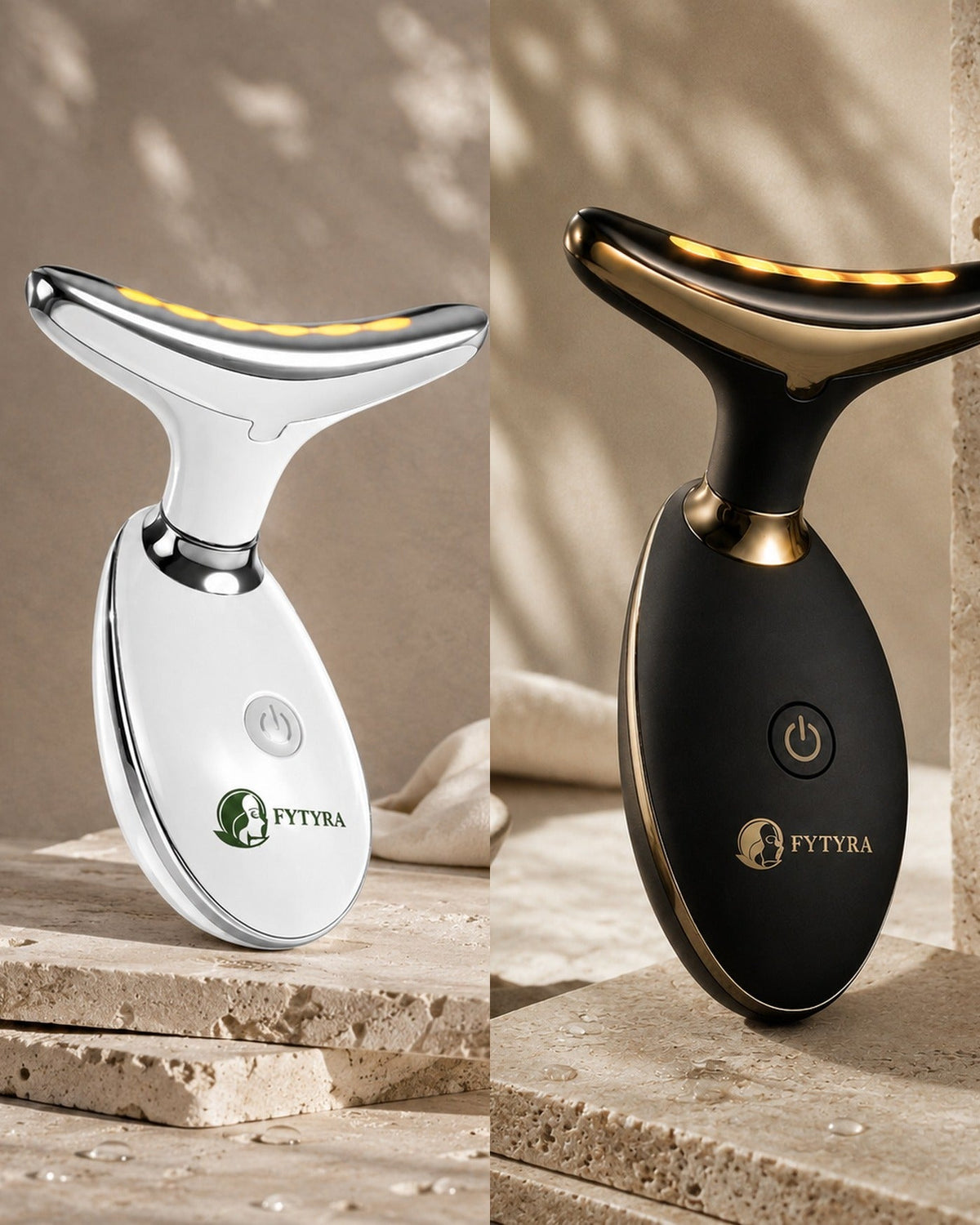 The Fytyra Sculpting Device in White beside the same device in Midnight on travertine